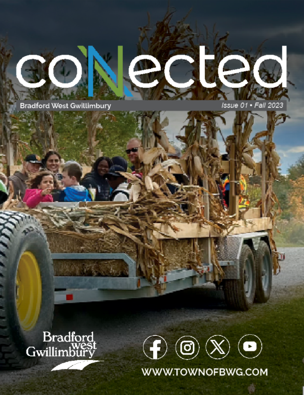 Fall 2023 Connected cover photo featuring photo of people on a tractor, cover reading "Connected, Bradford West Gwillimbury, Issue 01, Fall 2023. Cover also includes the BWG logo, social media icons, and Town of BWG website URL.