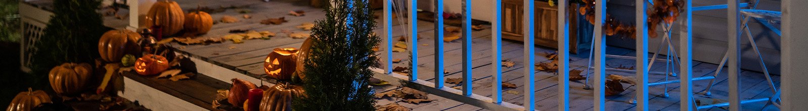 Halloween Jack-o-Lantern Pumpkins on a porch stairs