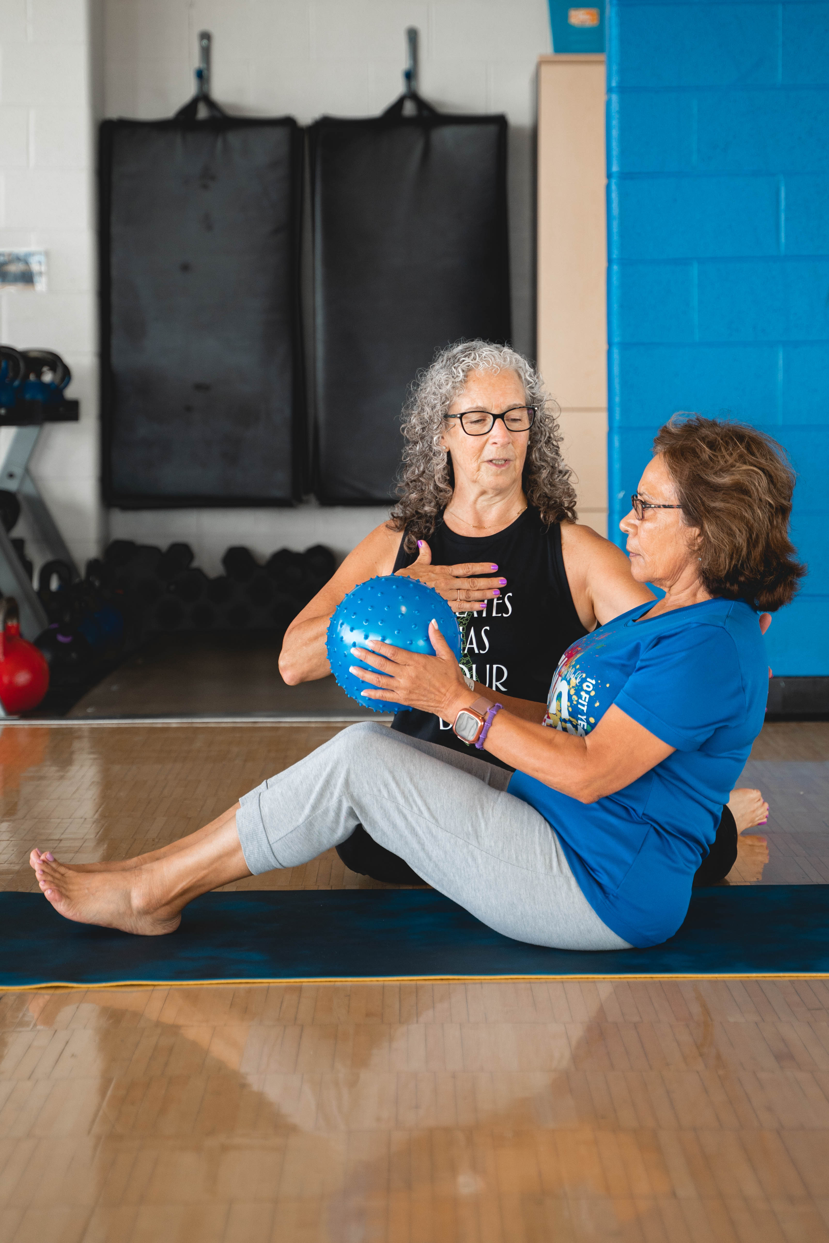 Pilates instructor with client 