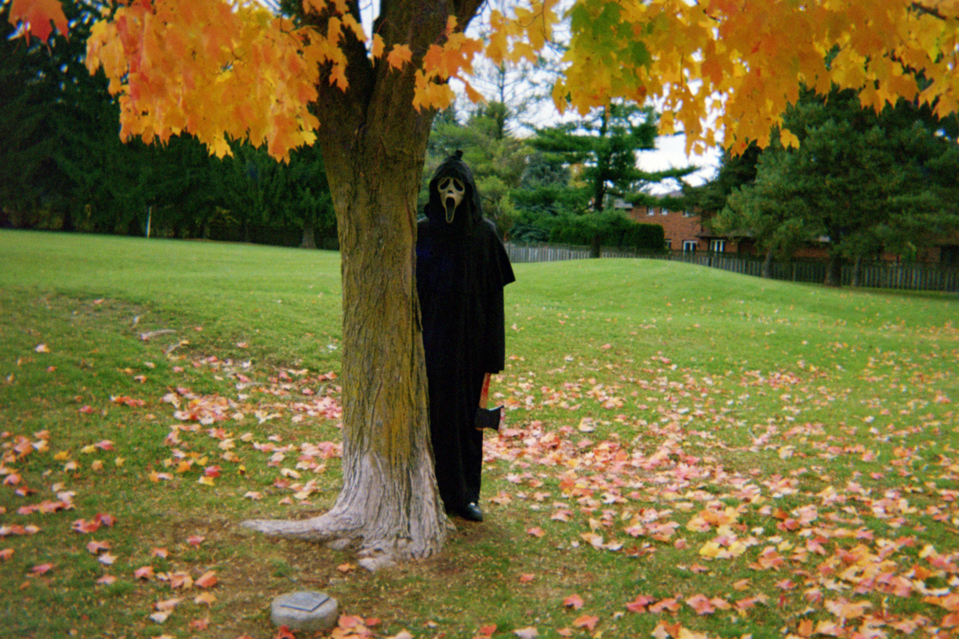 Scary character under tree