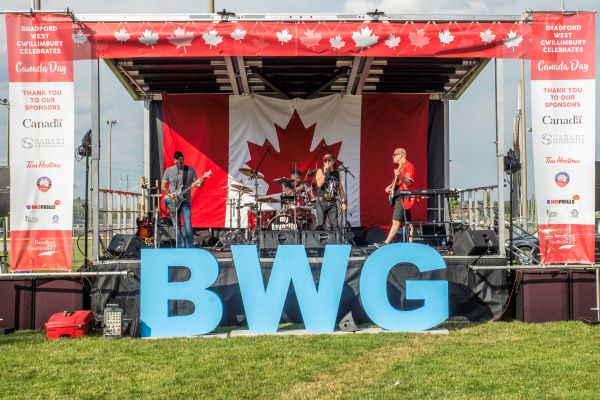 band on stage at Canada Day
