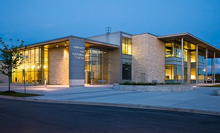 Exterior of BWG Public Library and Cultural Centre in the evening