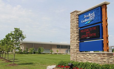 Sign outside of the BWG Leisure Centre, featuring the BWG logo and a digital sign reading "Welcome to the BWG Leisure Centre"