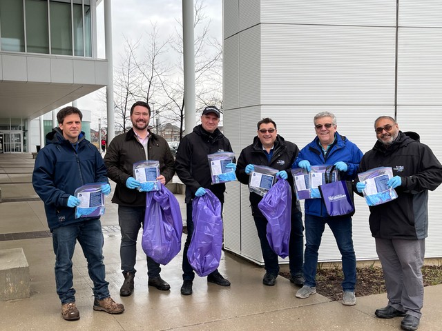 BWG Council members outside of the Leisure Centre holding clean-up kits for Community Clean-up Week.