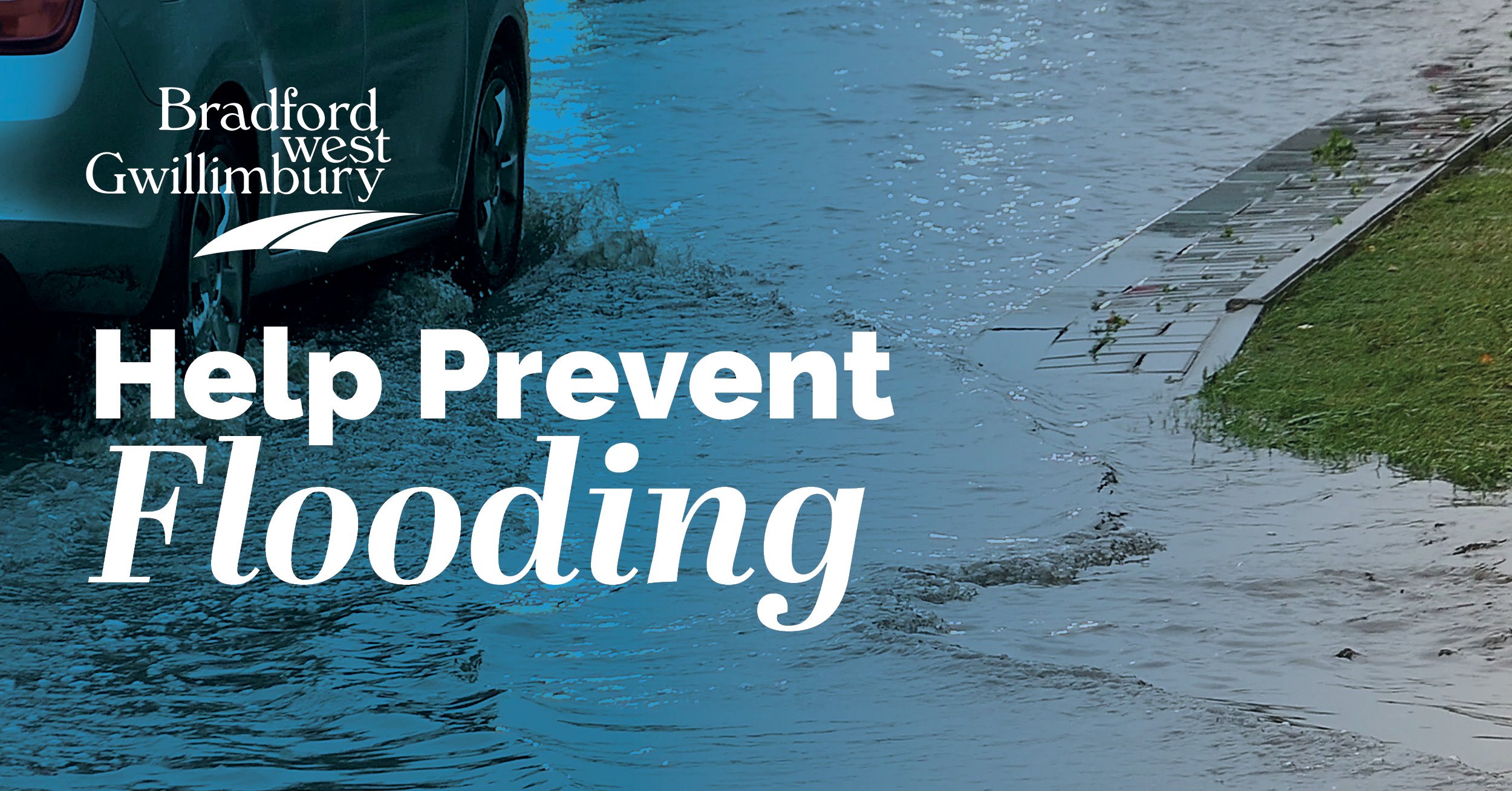 car driving through flooded road 