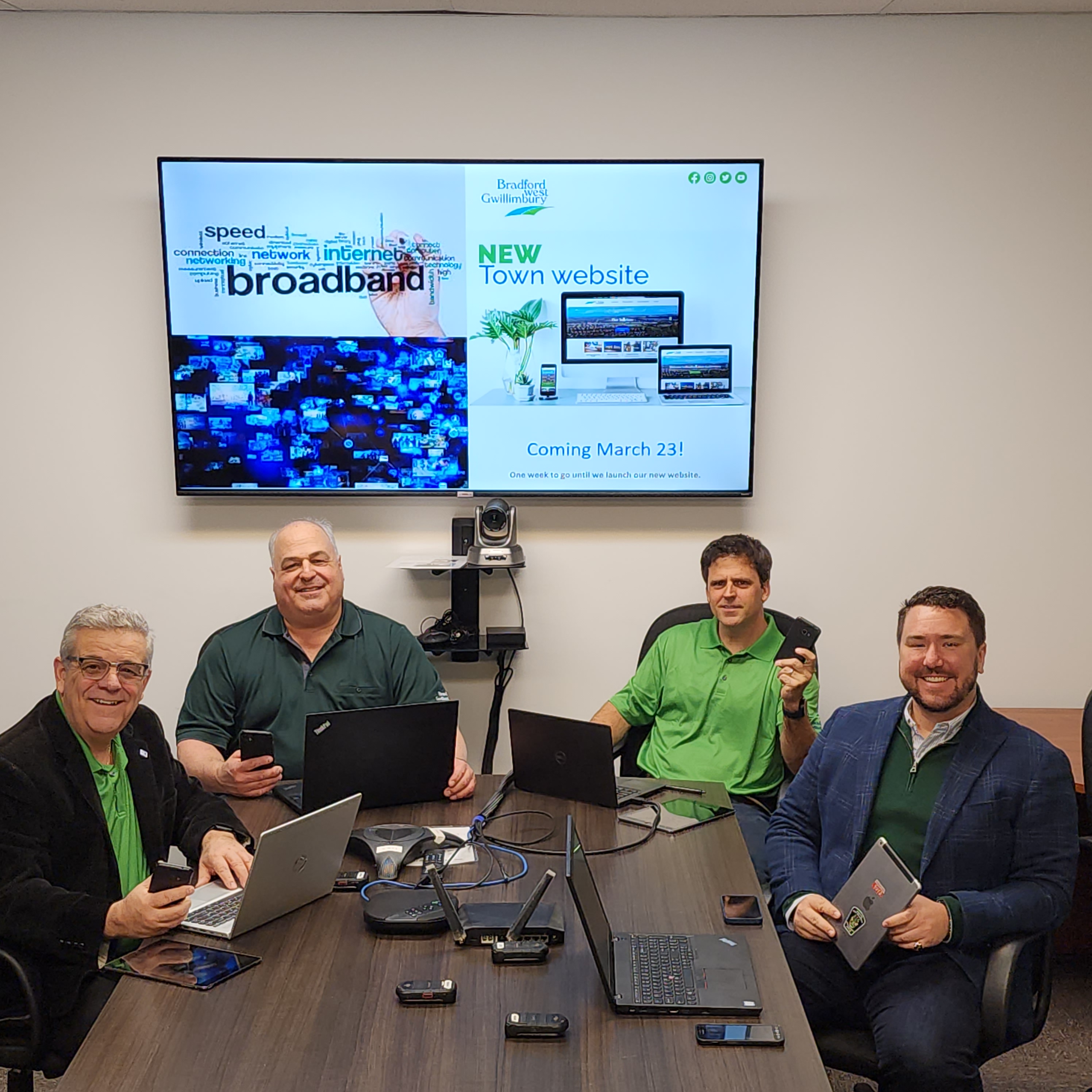 From left: Mayor James Leduc, Councillor Ben Verkaik, Councillor Peter Ferragine and Councillor Jonathan Scott pose in a March 2023 photo promoting the Town’s new website, which will be more widely available to residents and businesses with recent investments in broadband Internet services in BWG.