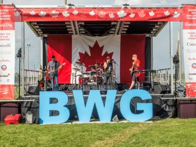 band on stage at Canada Day