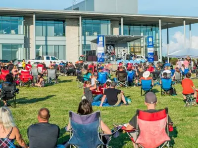 crowd watching band on stage