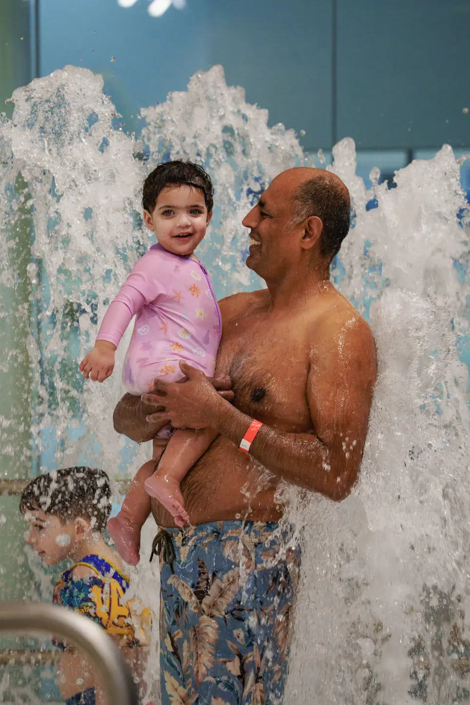 parent and child swimming